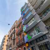 Come per il palazzo di piazza Umberto anche in questo caso l�edificio si trova affiancato da una rossa palazzina neoclassica e da un immobile residenziale della met� del secolo scorso, creando un contrastante quanto bizzarro mix architettonico